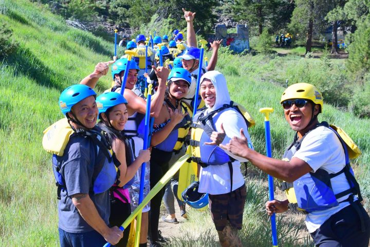 Pornanong Phatlum et al. that are standing in the grass