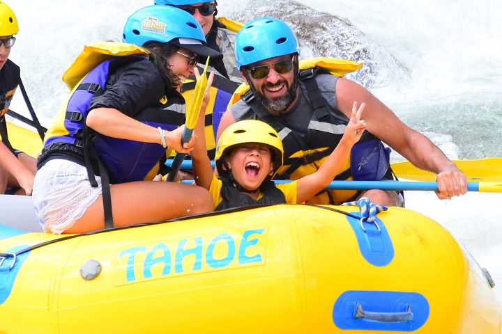 a group of people on a raft