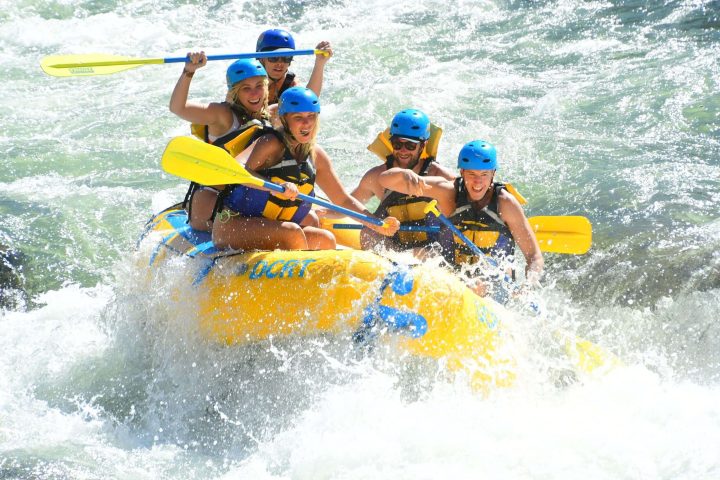 a man riding a wave on a surfboard in the water
