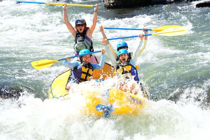 a person riding a wave on a surfboard in the water