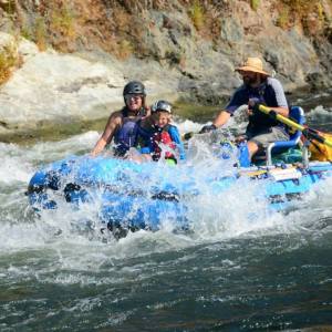 a group of people riding skis on a body of water