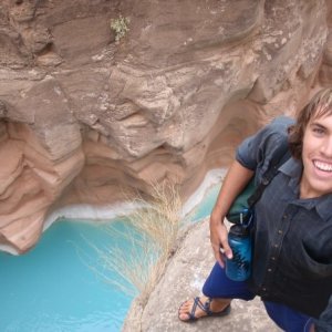 a girl in a pool of water