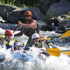 a man riding a wave on a surfboard in the water