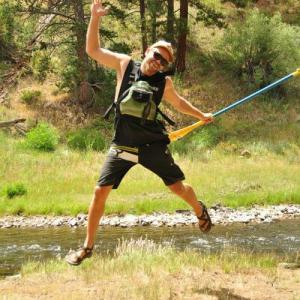 a man holding a baseball bat on a field