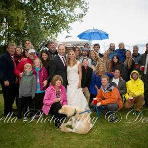 a group of people that are standing in the grass