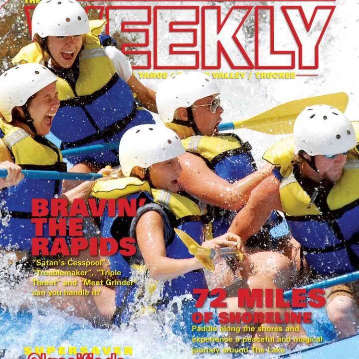 a group of people riding on a raft