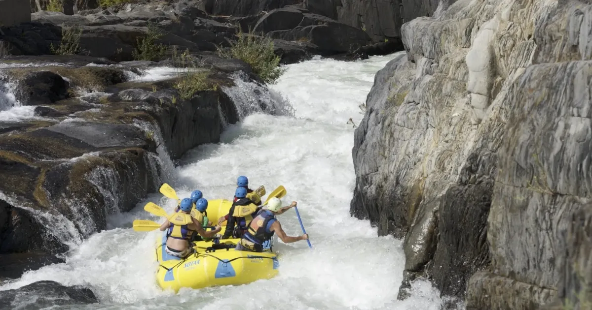 Middle-Fork-American-River-Tunnel-Chute-Class-IV-Whitewater-image-1 a man on a raft in a pool of water