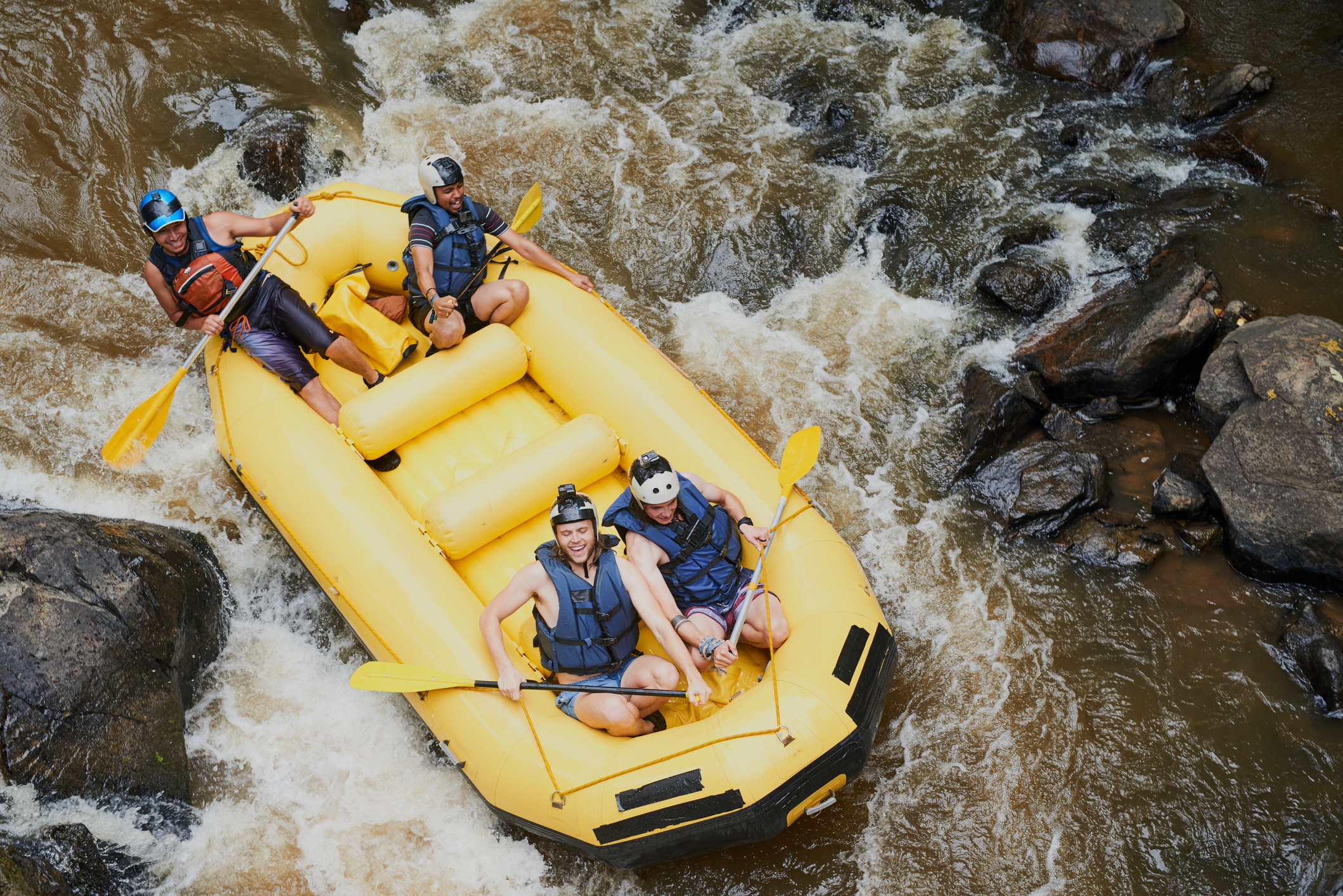 A group of whitewater rafters takes on the challenging waters near Tunnel Chute, American River.