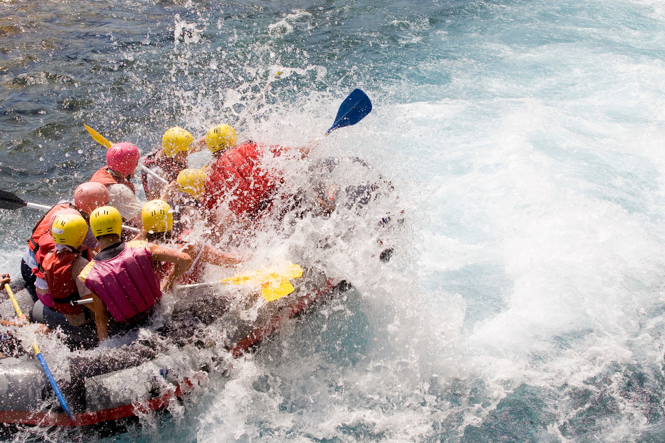 A family white water rafting the Truckee River near Lake Tahoe.